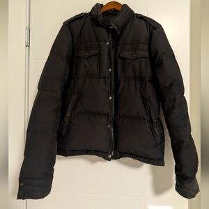 Thick pile down puffer jacket. Military inspired with epaulets on shoulders.
